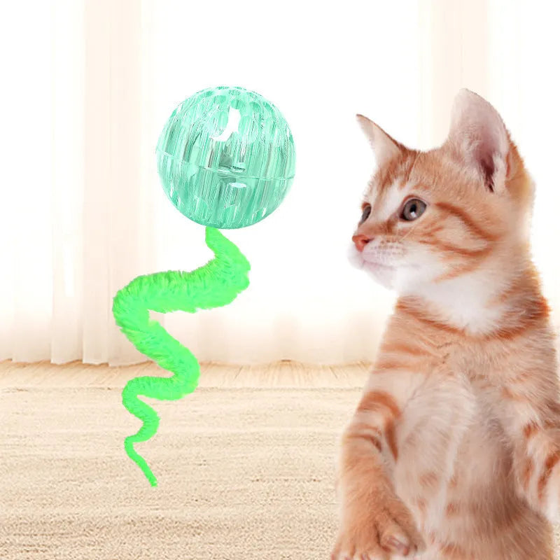 Interactive cat ball toy with worm tail in green on light background