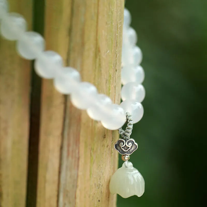 S925 silver bracelet with white agate and Hetian jade lotus design for women