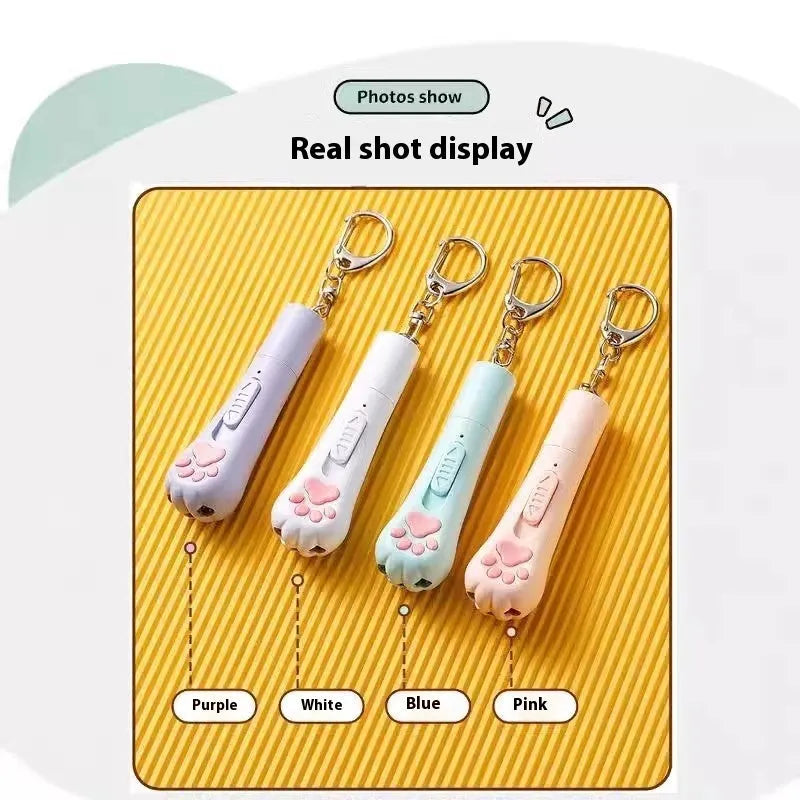 Plastic cat teasing wand with pen light attachment in cream white colour