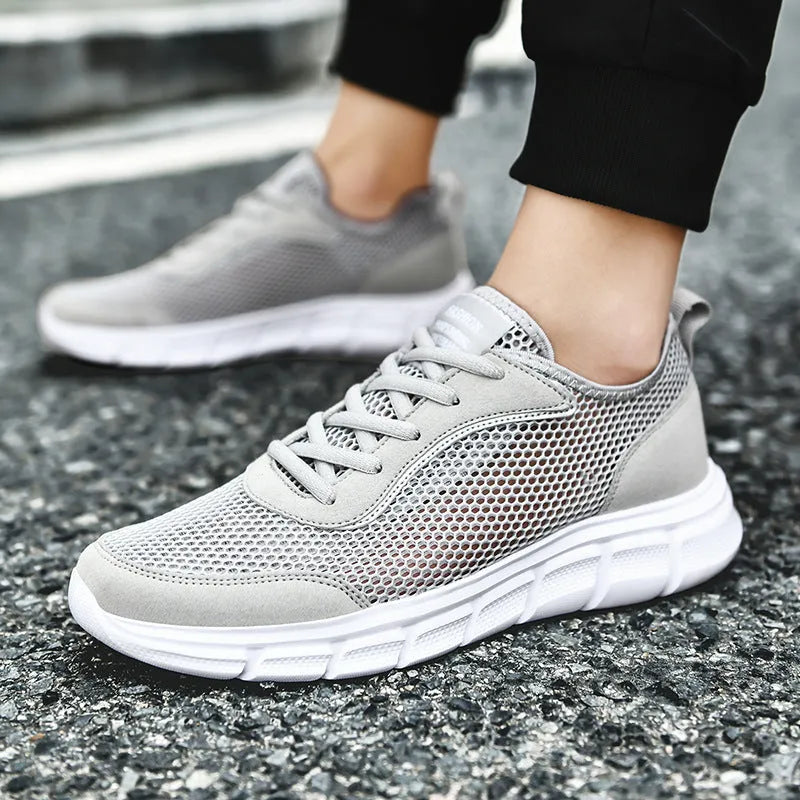 Men's breathable hollow mesh sports shoes in black, blue, and grey, sizes 37 to 48