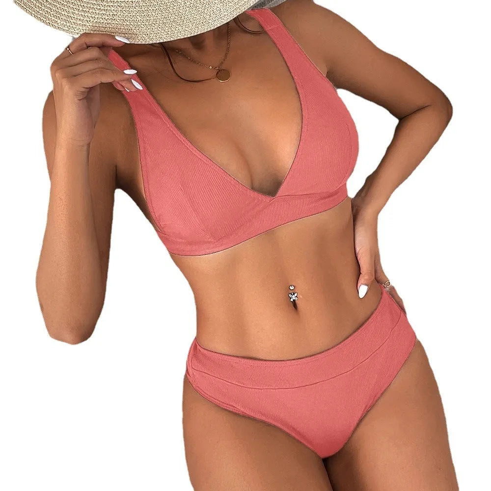 Women's bikini lace-up split swimsuit in black with ribbed texture and backless style
