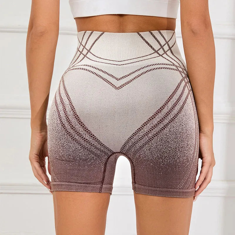Women's high-waisted fitness shorts with gradient colour pattern in black and brown options