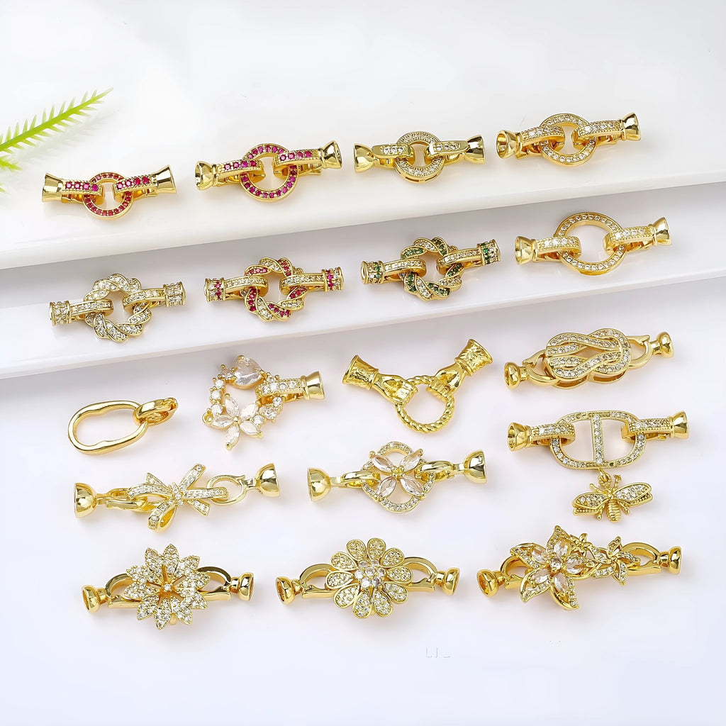 Small gold-coloured jewellery clasp and end hook for DIY necklace or bracelet making and repair.