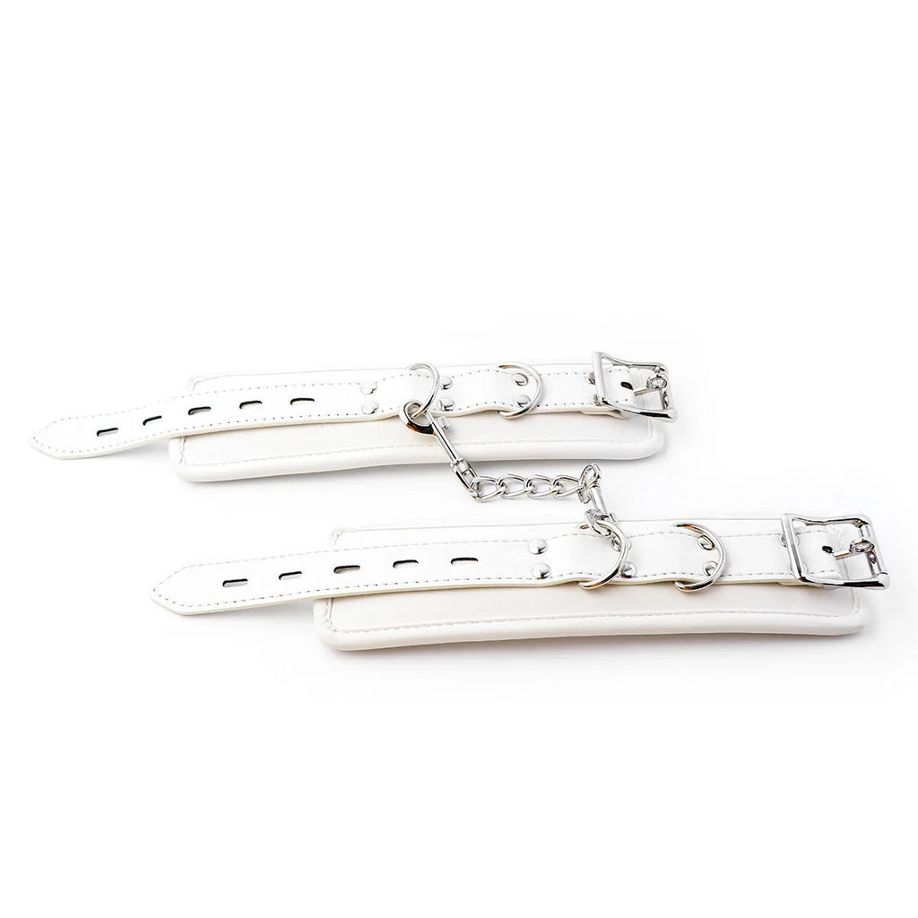 White PU sponge bondage set showing handcuffs, footcuffs and neck scarf for comfortable restraint accessories