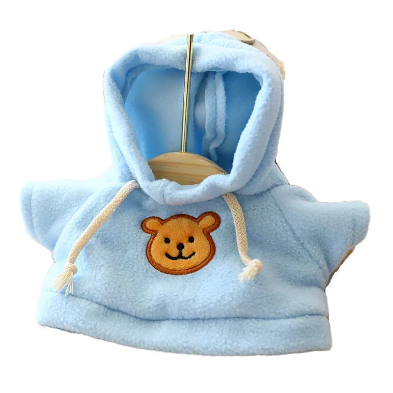A blue cloth dog hoodie on a mannequin, shown with a separate hood, representing the medium or large size pet sweater.