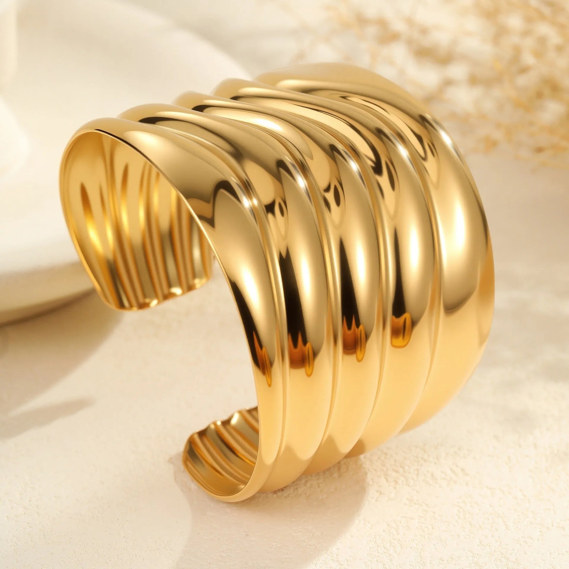 Women's wide geometric wave bracelet with asymmetric design and 18K gold plating