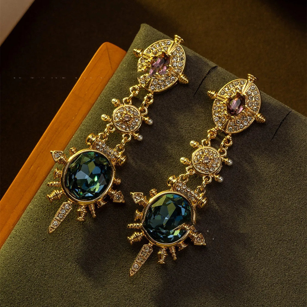 A pair of gold colour alloy stud earrings with geometric round shape in retro court style