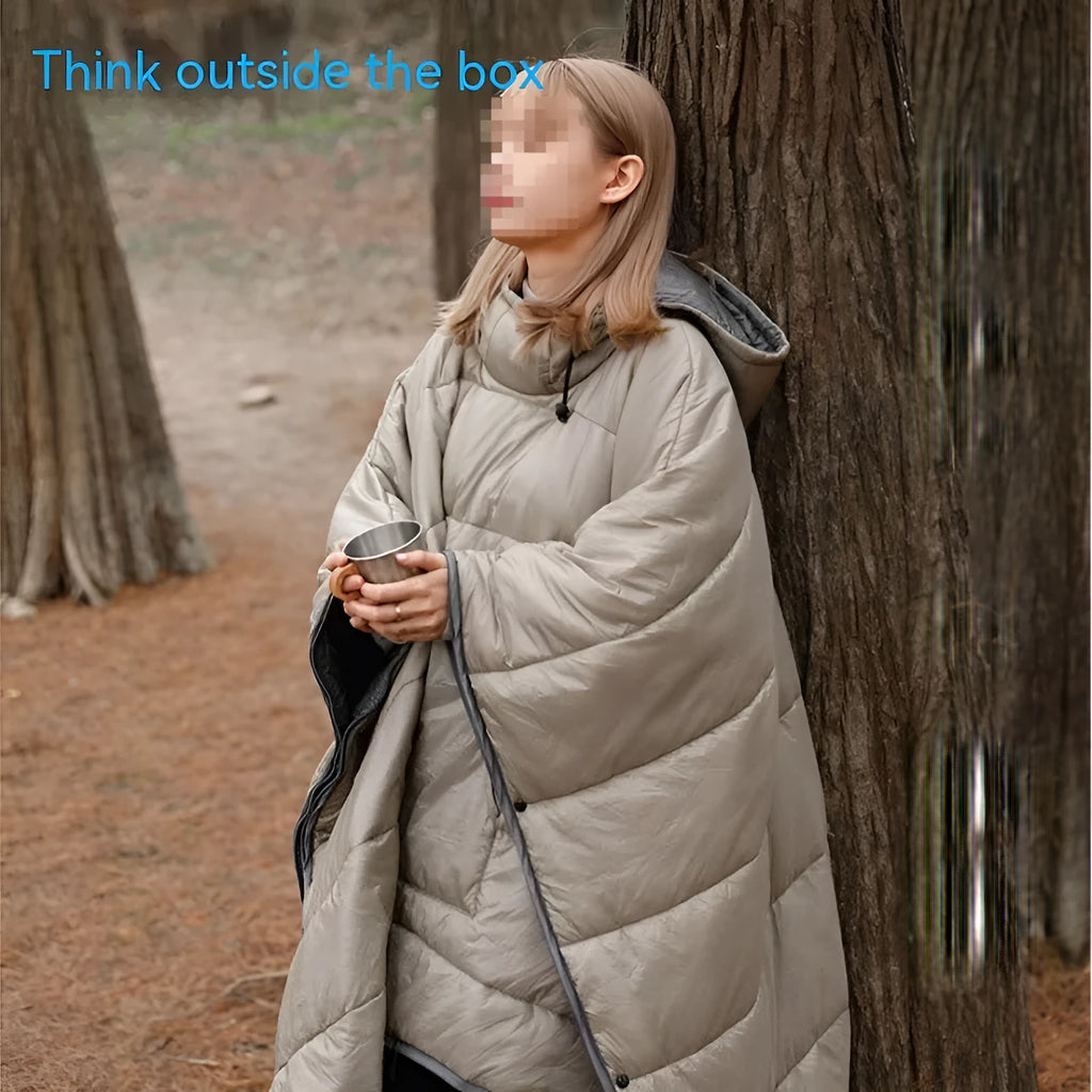 Outdoor cloak sleeping bag shown as wearable cape and flat 200x140cm blanket in army green