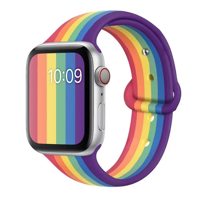 Silicone sports wristband with single buckle strap in black, rainbow, or white colour options