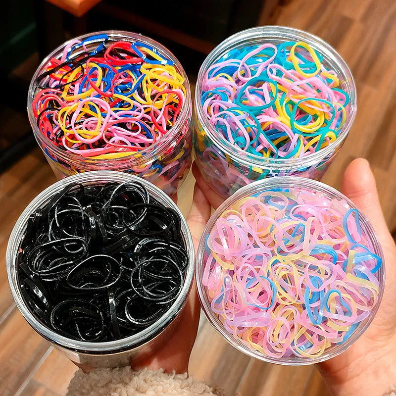 Multicolour TPU baby hair ties in a reusable container for toddlers and girls, 300 or 600 piece pack