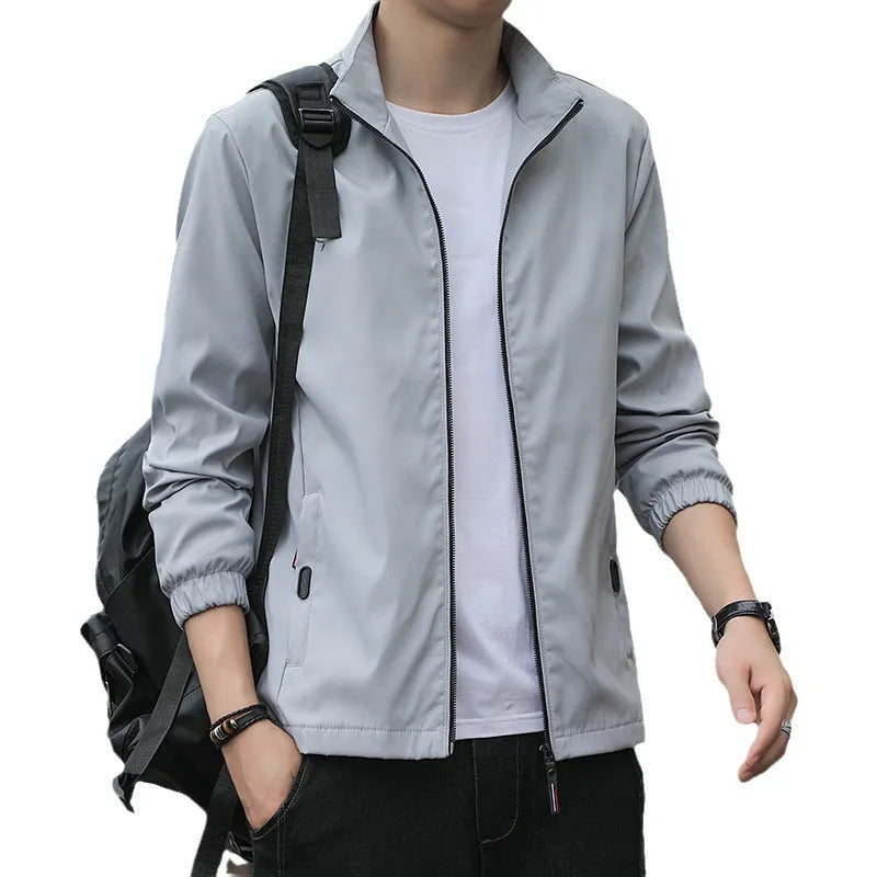 Korean style loose lapel autumn jacket in black with zip pockets shown in casual setting