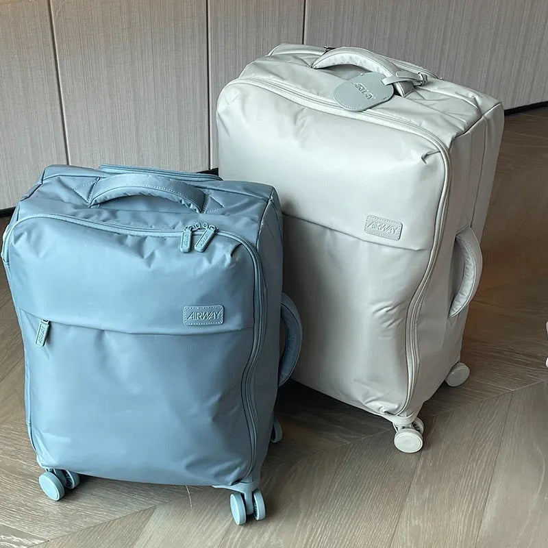 20-inch ultra-light waterproof Oxford cloth suitcase in bluestone green with universal wheels