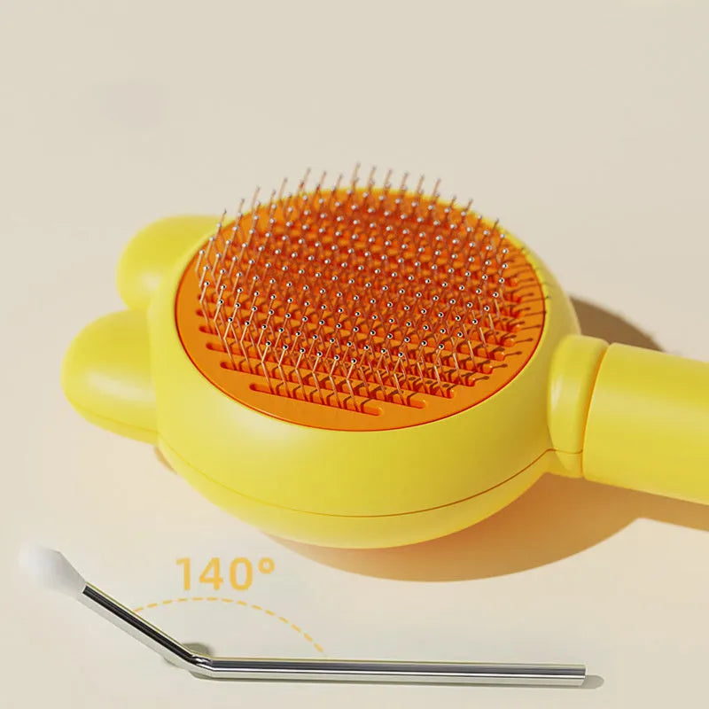 Self-cleaning pet brush with release button, stainless steel comb with rubber-tipped needles