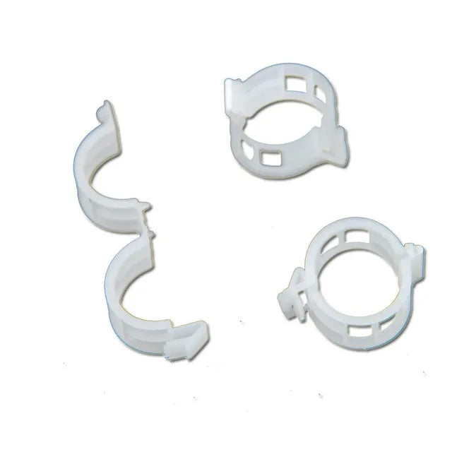 A pack of 50 plastic plant grafting clips in assorted colours for supporting tomato plants and garden vines.
