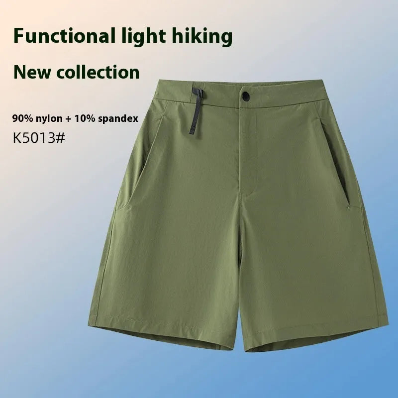 Men's quick-drying sports shorts in khaki colour with elastic waistband.