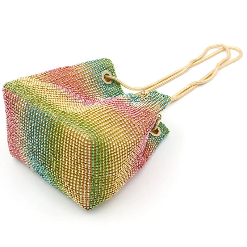 Soft rhinestone bucket handbag with diamond stud detailing in rainbow colour variations