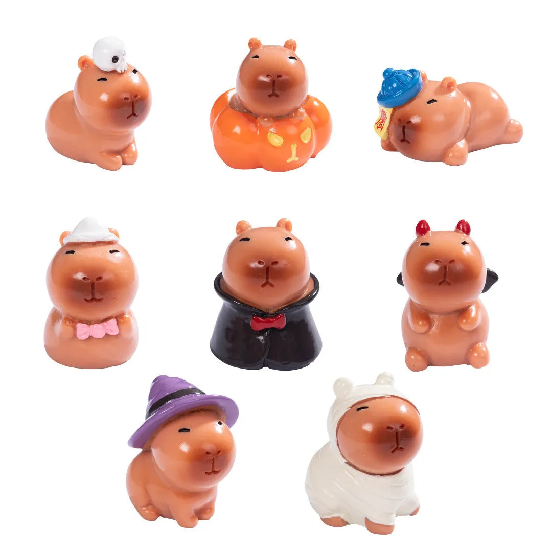 Set of eight micro landscape Halloween capybara resin decorations in assorted costumes including pumpkin and vampire