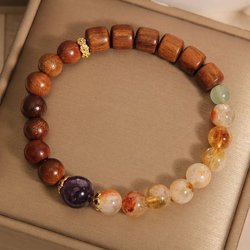 Women's crystal bracelet in yellow tower crystal, ebony, amethyst with pearl and sequin accents