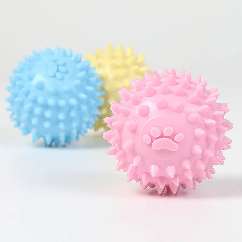 Blue TPR rubber chewing ball for dogs with footprint design and textured surface for tooth cleaning
