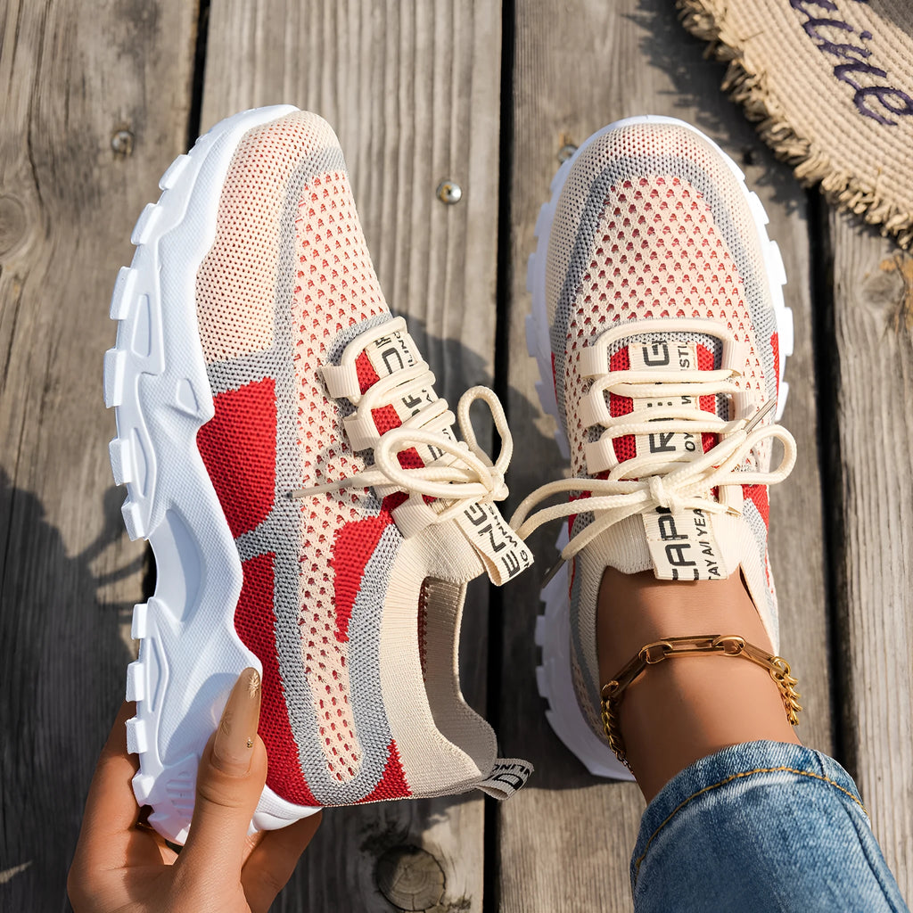 Women's Flyknit mesh lace-up sneakers in multiple colours on a white background.