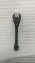 540 needle derma roller with coloured handle and wheel, showing needle head specifications 0.2mm, 0.25mm, 0.3mm.