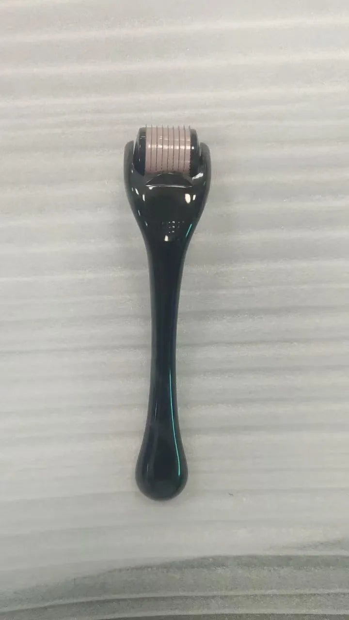540 needle derma roller with coloured handle and wheel, showing needle head specifications 0.2mm, 0.25mm, 0.3mm.