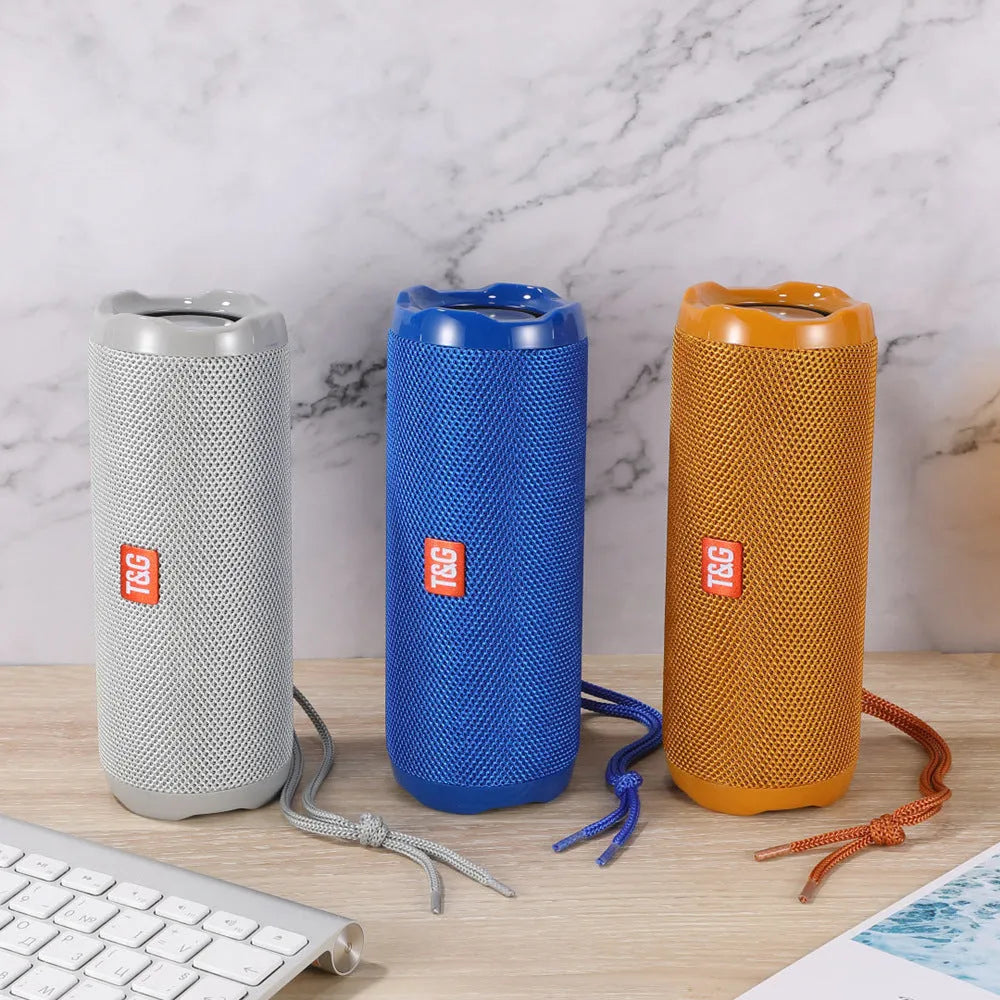Fabric-covered portable Bluetooth speaker with card holder in multiple colour options