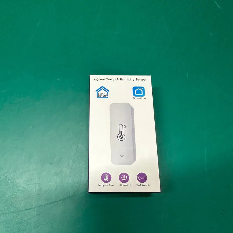 WiFi temperature humidity sensor with Tuya Zigbee connectivity in compact ABS housing