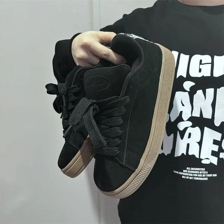 Black retro low-top sneakers with waterproof platform, round toe, and lace-up closure for men and women