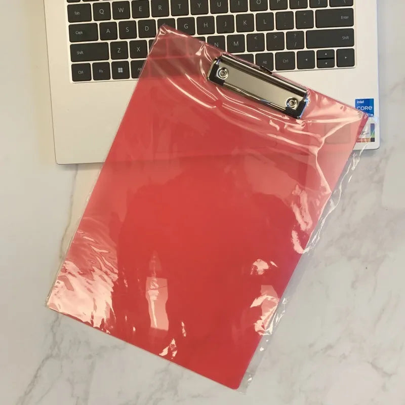 A4 blue plastic writing pad portfolio folder with metal clip, showing transparent front plate.