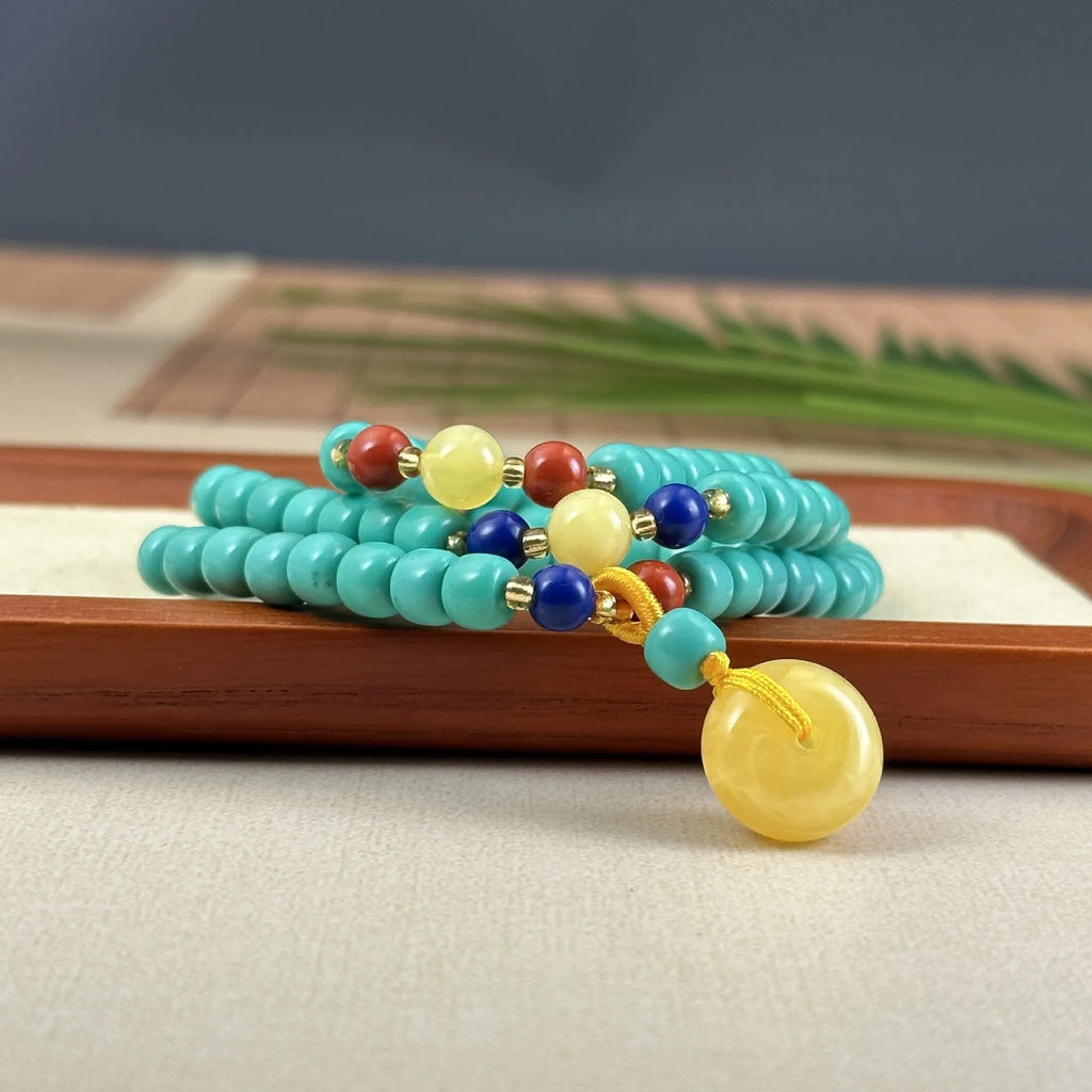 Turquoise mesh flower lucky pendant necklace on ball bead chain, hand-woven design