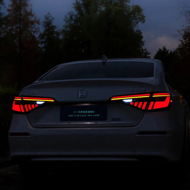 11th Generation Honda Civic black and red LED taillight assembly with streamer indicators.