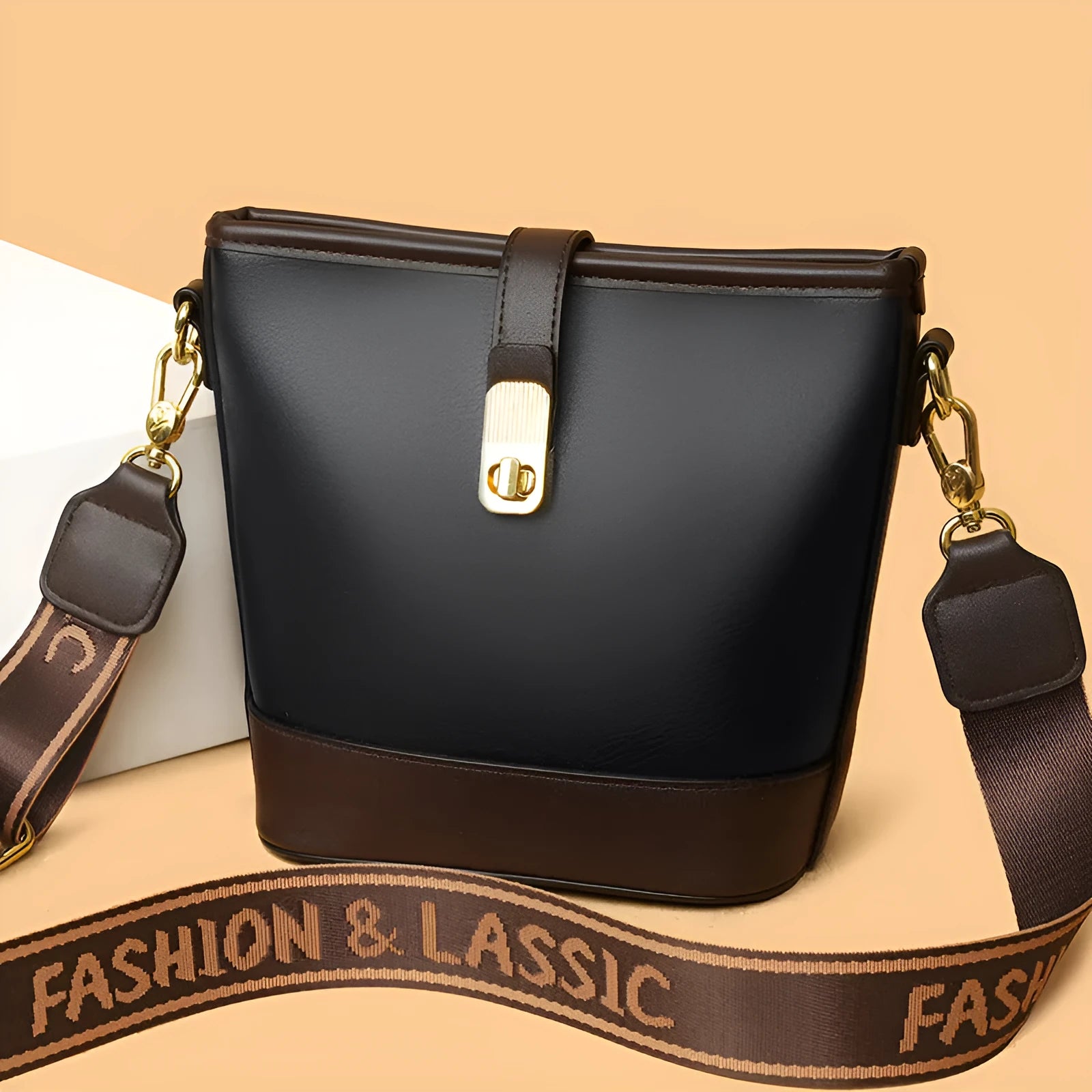 Korean style black bucket messenger bag with double shoulder straps and multiple interior compartments