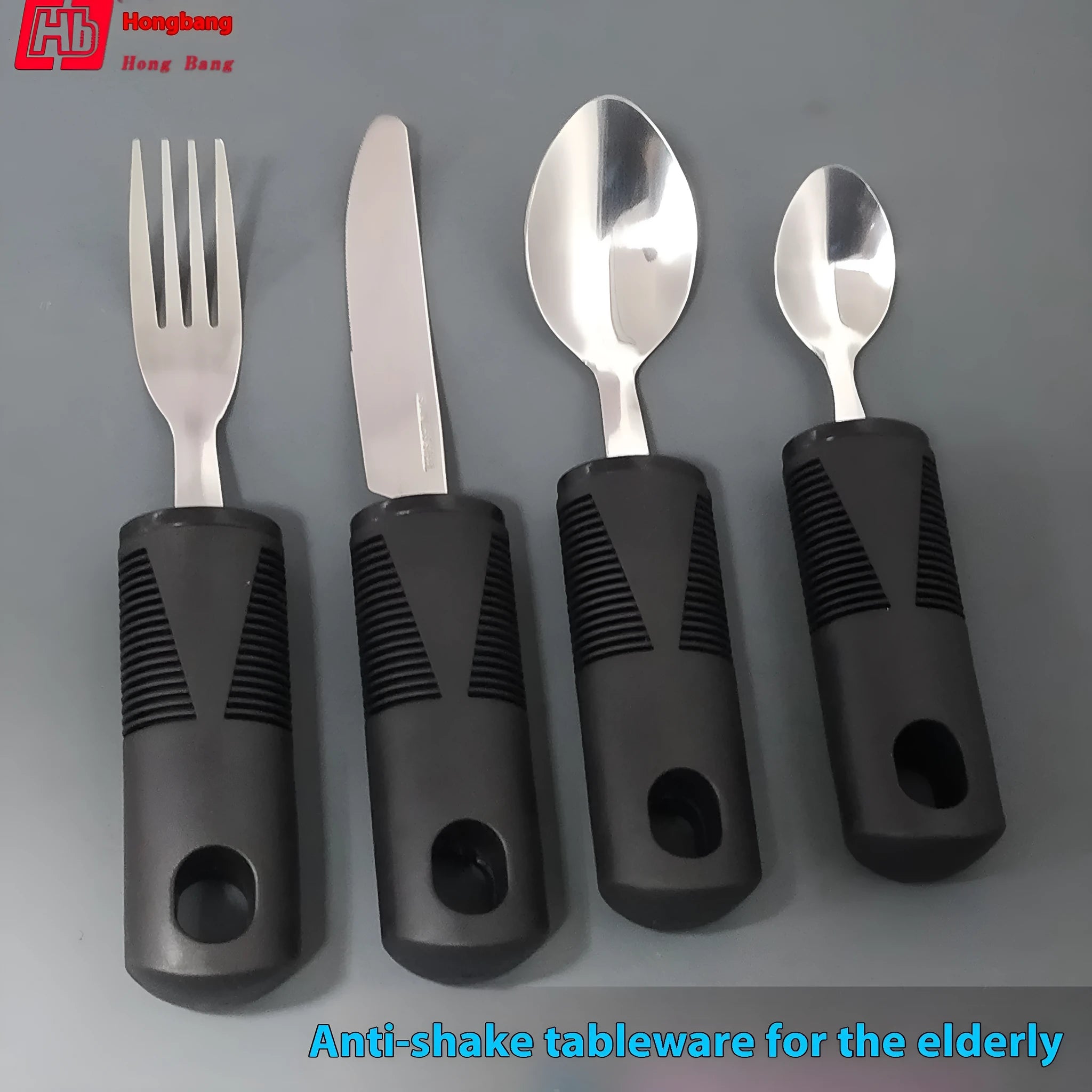 Stainless steel anti-shake tableware set with adaptive rubber grip handles in black and grey options
