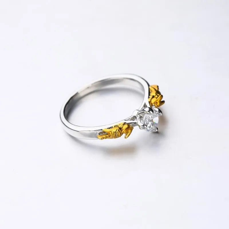 Copper crown crystal ring with black gold finish showing sizing options
