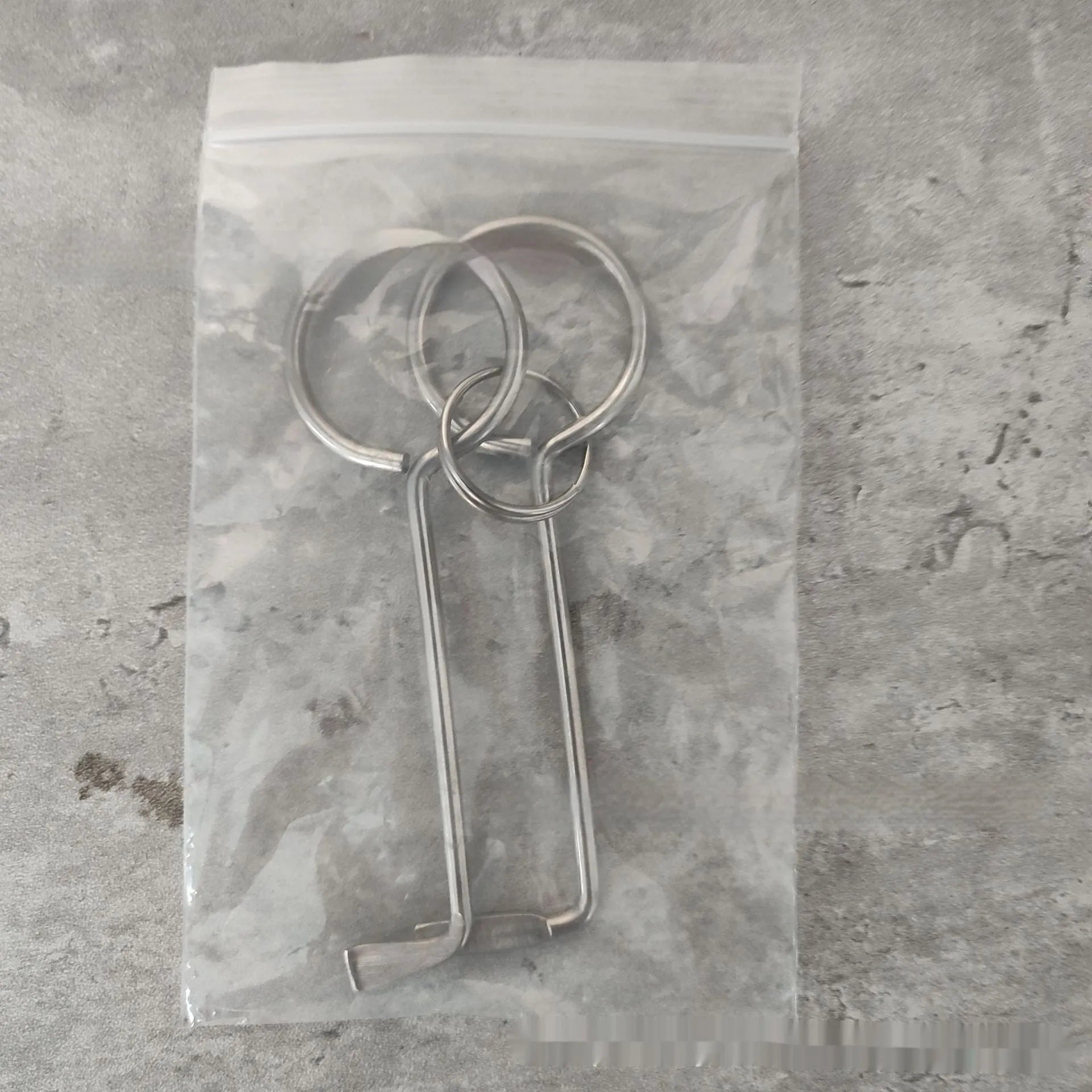 Two identical silver alloy steel adjustable wrench tools side by side.