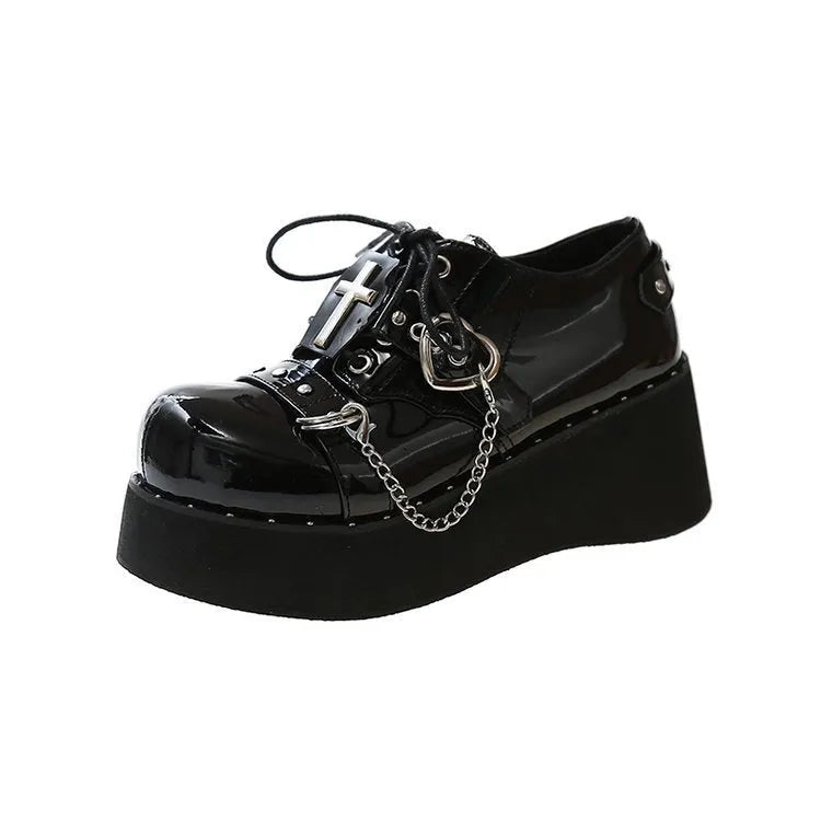 Black punk platform leather shoes with rubber sole and decorative stitching in dark lolita style