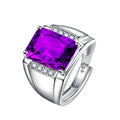 Adjustable geometric copper ring with a purple amethyst-coloured rhinestone centrepiece.