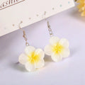 Handmade Plumeria Rubra resin earrings in eight colours including blue and pink, lightweight floral design for pierced ears