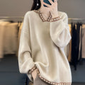 Women's white V-neck viscose sweater with long sleeves on hanger