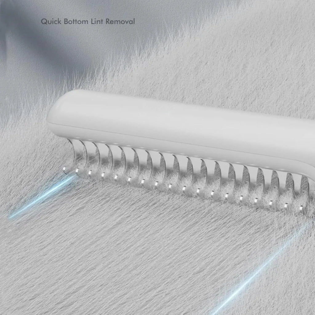 Stainless steel pet dematting comb with rake teeth and a handle for grooming dogs.