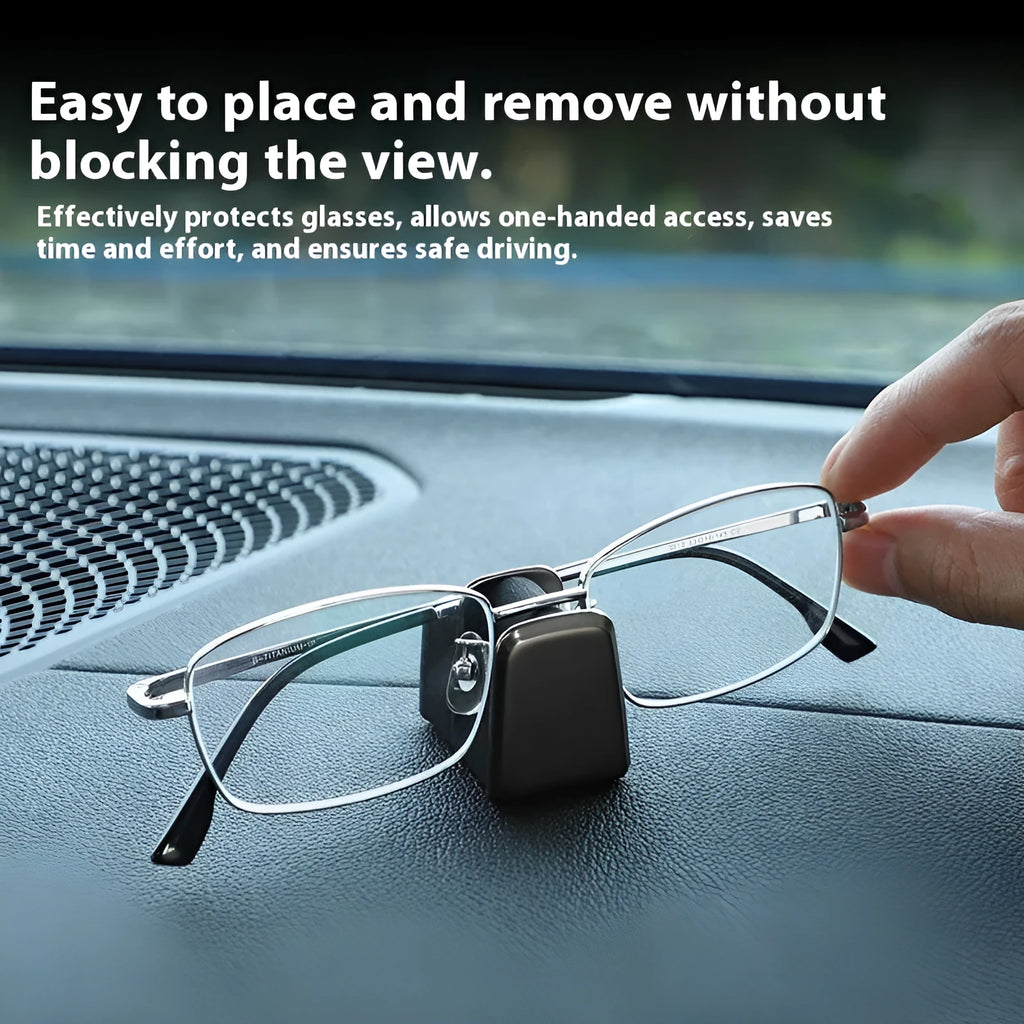 Green zinc alloy and leather glasses clip holder for car dashboard.