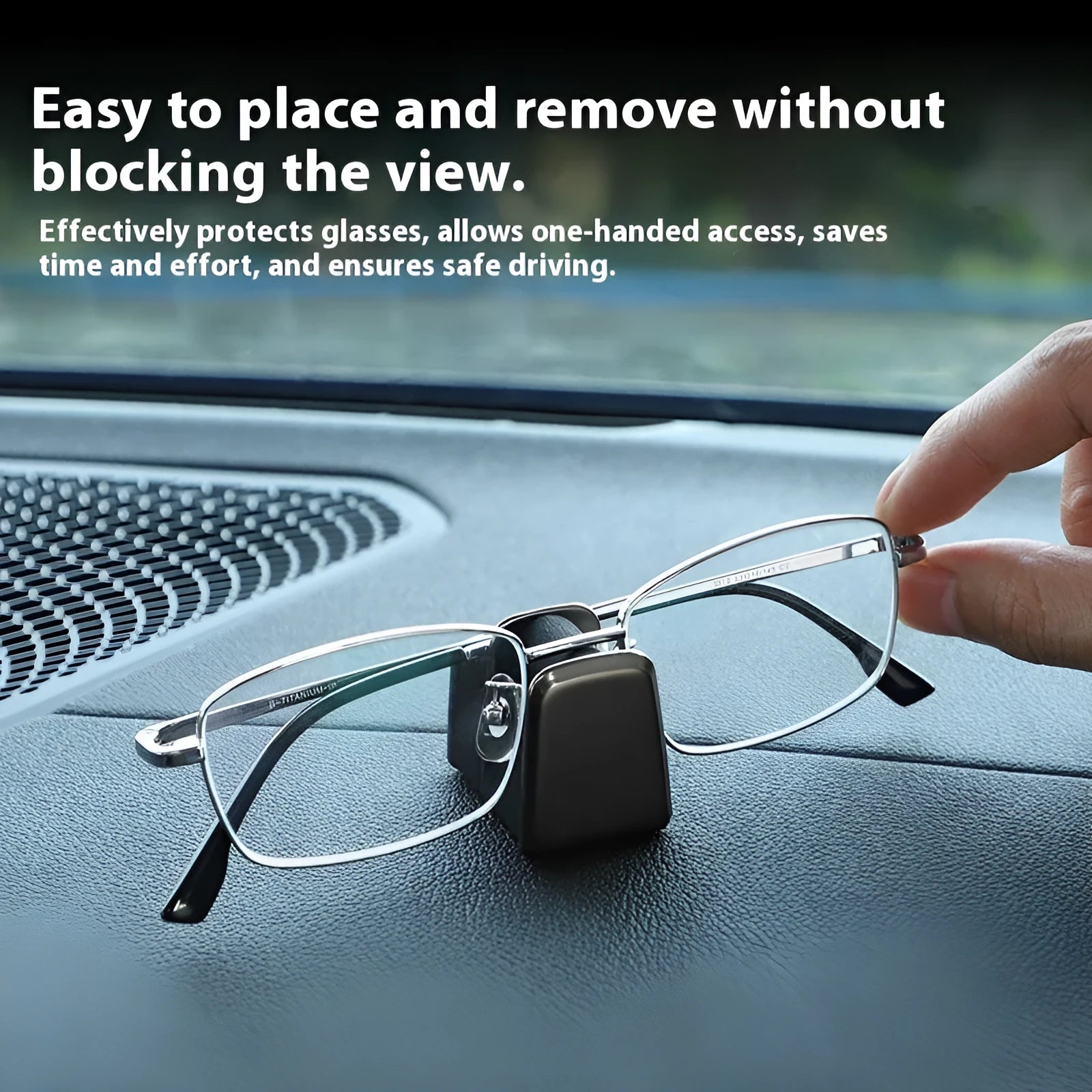 Green zinc alloy and leather glasses clip holder for car dashboard.