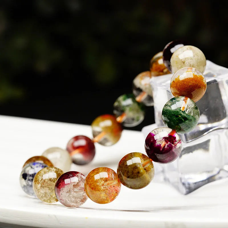 Crystal ball bracelet with ethnic style retro ghost cornucopia design and colourful beads