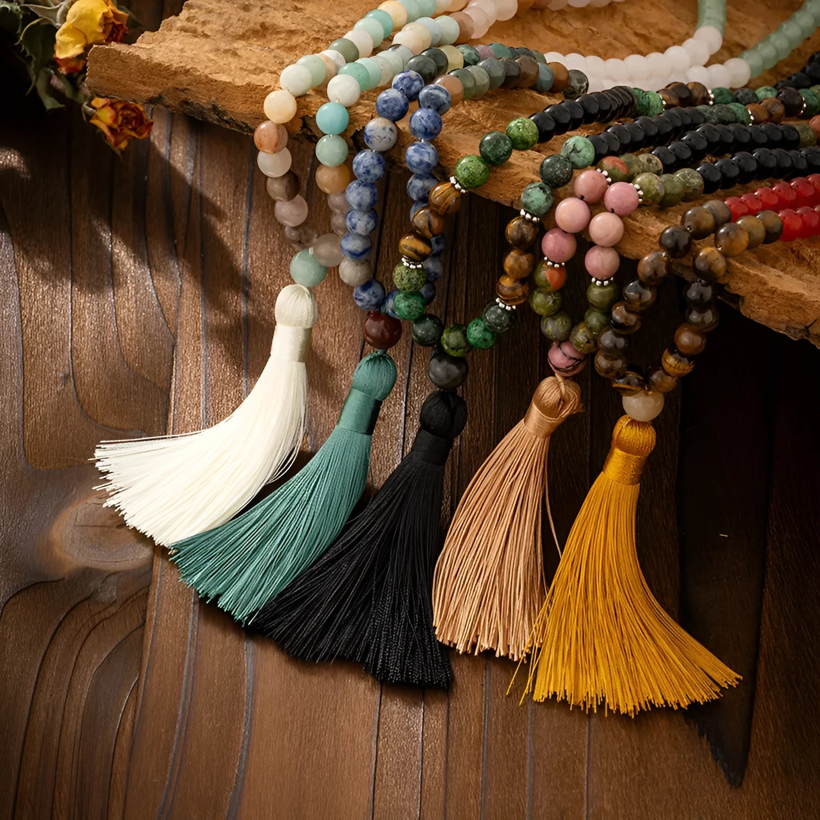 Vintage bohemian style beaded chain necklace with geometric round beads and tassel details