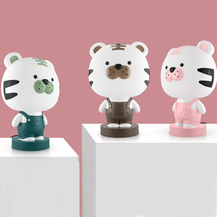 Cartoon animal table lamp in bear, cattle, rabbit, or tiger designs with LED light and plastic shade