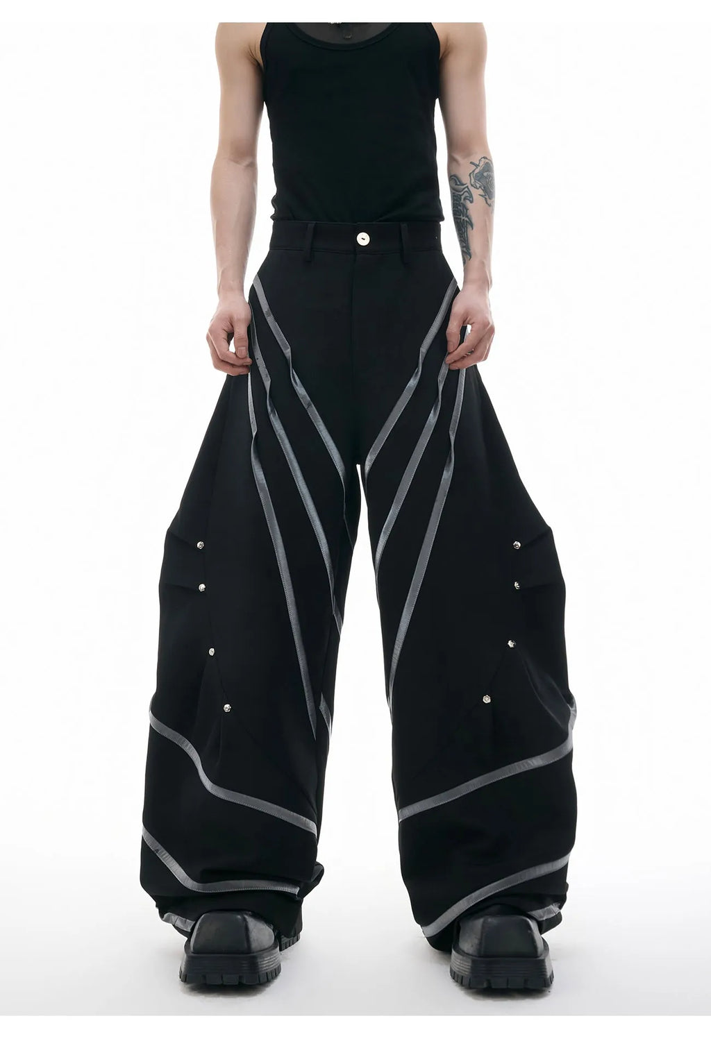 Men's trousers with three-dimensional cutting and metal striped rivet pleated details
