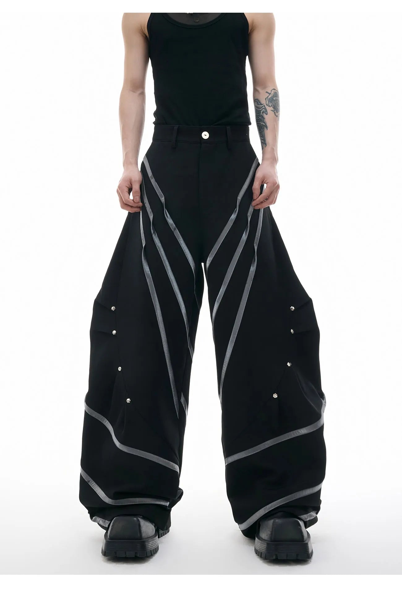 Men's trousers with three-dimensional cutting and metal striped rivet pleated details