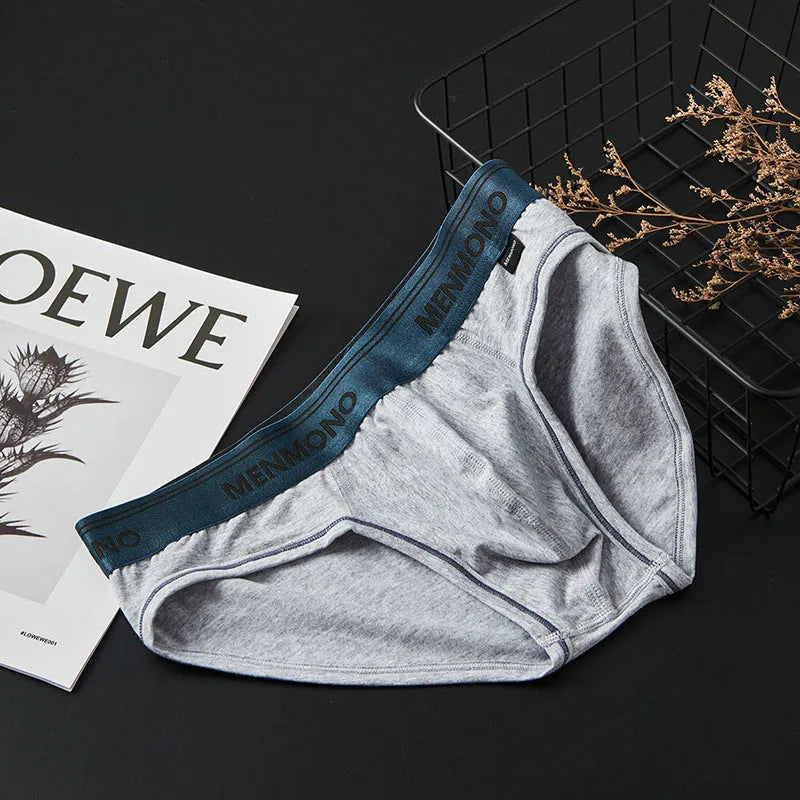 Men's cotton low waist briefs in two-tone colour combinations showing solid colour design