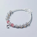 Natural moonstone adjustable bracelet with crescent moon charm and crystal accent on wrist